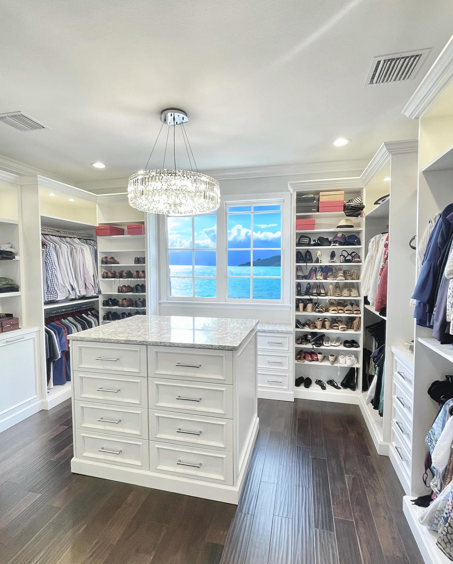 clean white organized custom cabinet closet